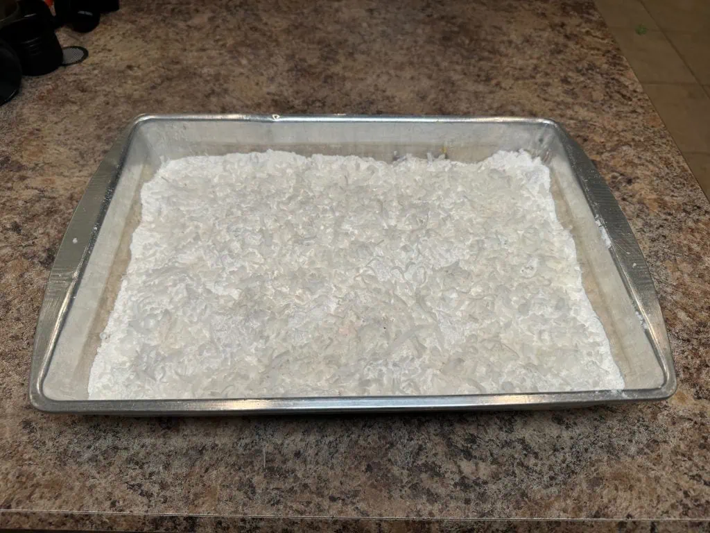 Sprinkled cake mix and coconut flakes.